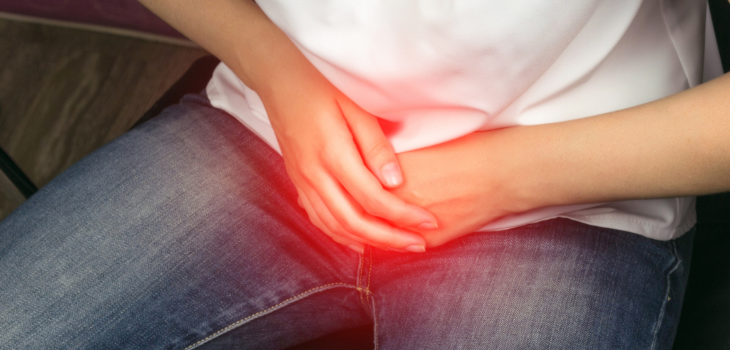 Syphilis: Hände werden vor den schmerzenden Schritt gehalten